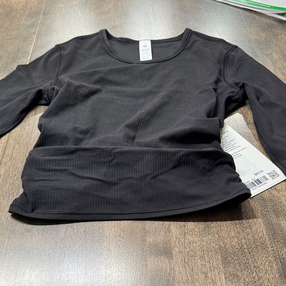 Lululemon Black Ribbed Women's Top “back- twist rib long sleeve”